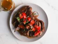 Smoky Oven-Baked Flank Steak With Tomato Vinaigrette Recipe